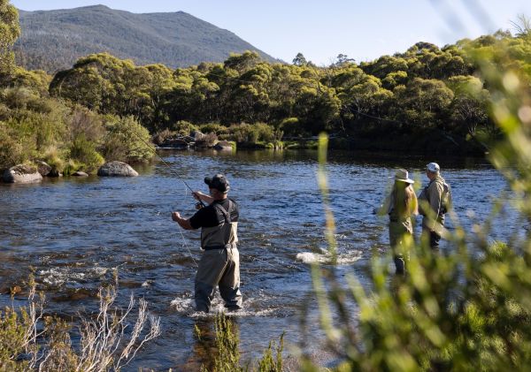 People fishing in river, Clearwater Fly Fishing Guides, Snowy Mountains - Credit: Clearwater Fly Fishing Guides 